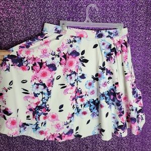 White skater skirt with pink and blue florals